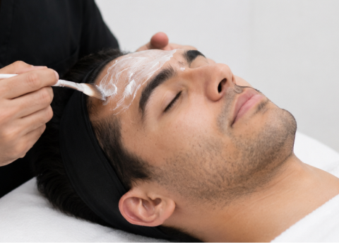 Model receiving facial massage at Wrapture Beauty Academy