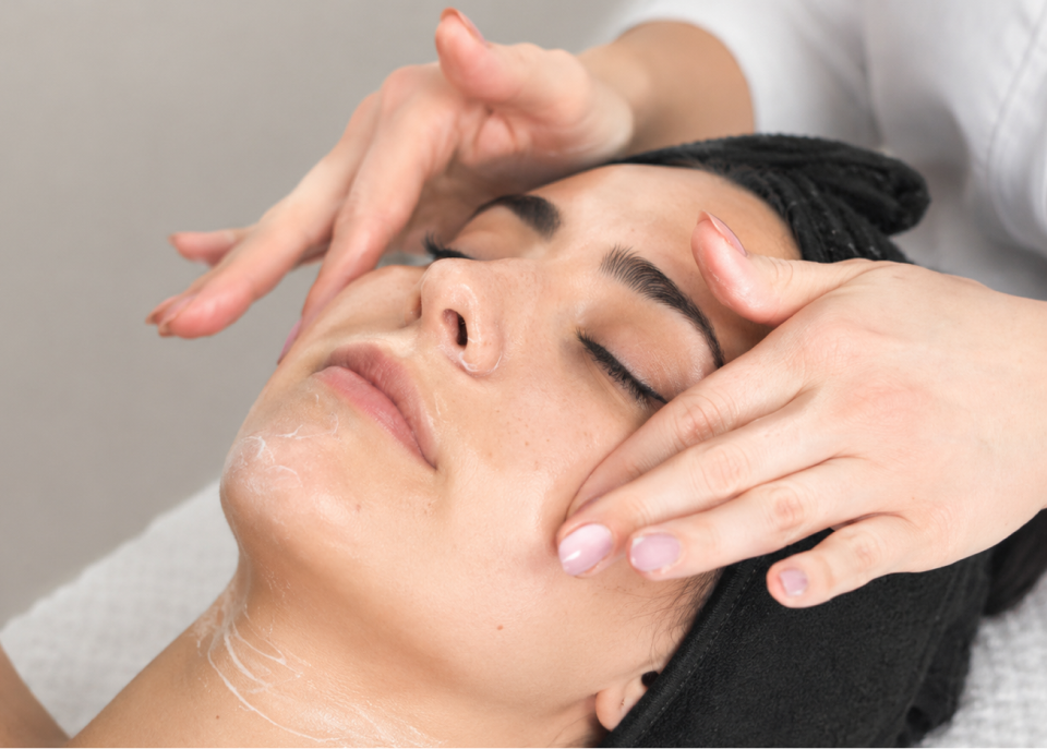 Model receiving facial massage at Wrapture Beauty Academy